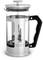 Stříbrná skleněná French press Bialetti s černou rukojetí a kovovým tlakovým mechanismem.