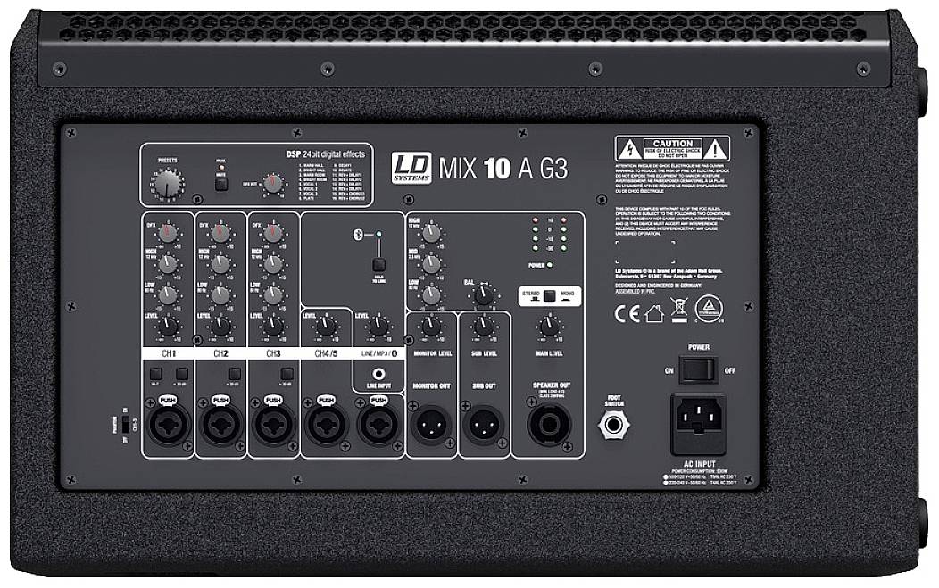 Zadní strana mixážního pultu reproduktorů s ovládacími prvky, konektory a přepínači. Označený štítkem 'MIX 10 A G3'.