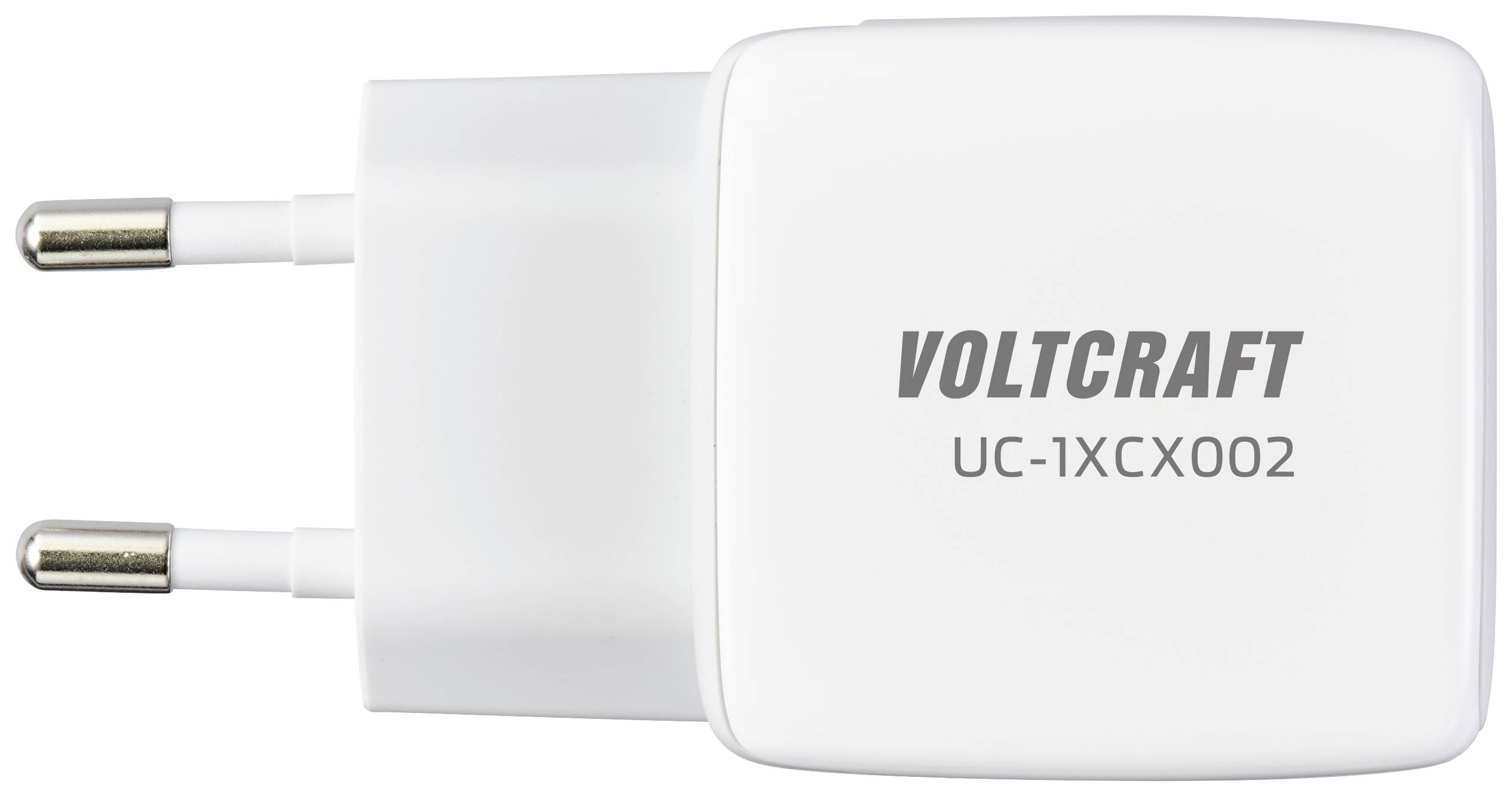 Bílá nabíječka s nápisem 'VOLTCRAFT UC-1XCX002'. Má dva evropské zástrčkové kontakty.