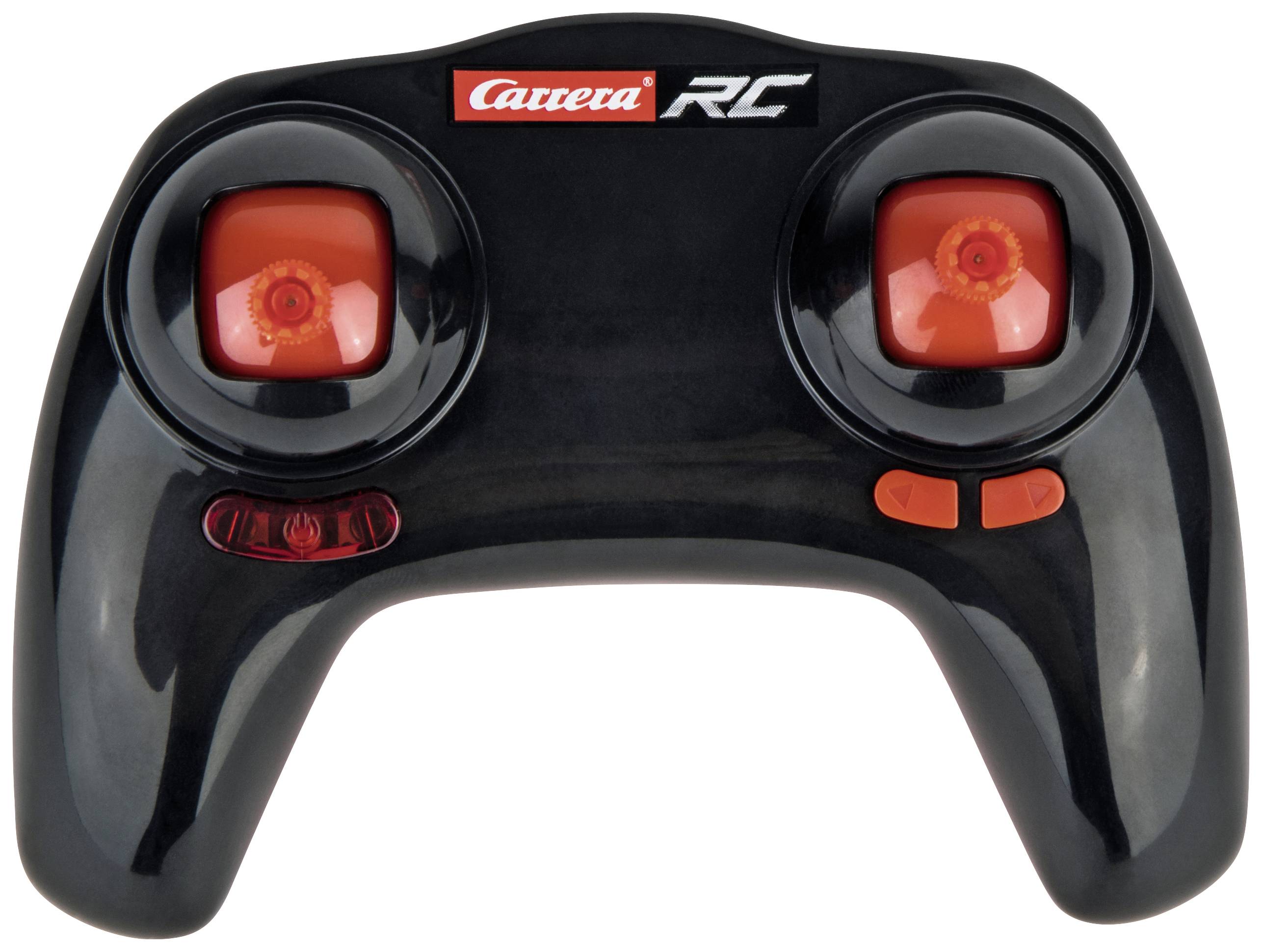 Černý dálkový ovladač Carrera RC se dvěma červenými ovládacími pákami a dvěma červenými tlačítky, používaný k řízení RC modelů vozidel.