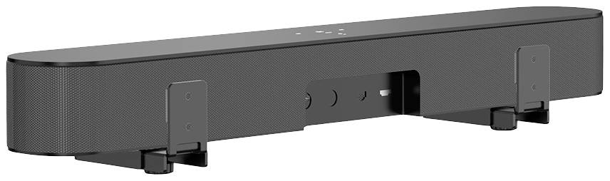 Černý soundbar se zaoblenými rohy na stole. Na horní straně jsou viditelné ovládací tlačítka a na přední straně jsou patrné držáky.