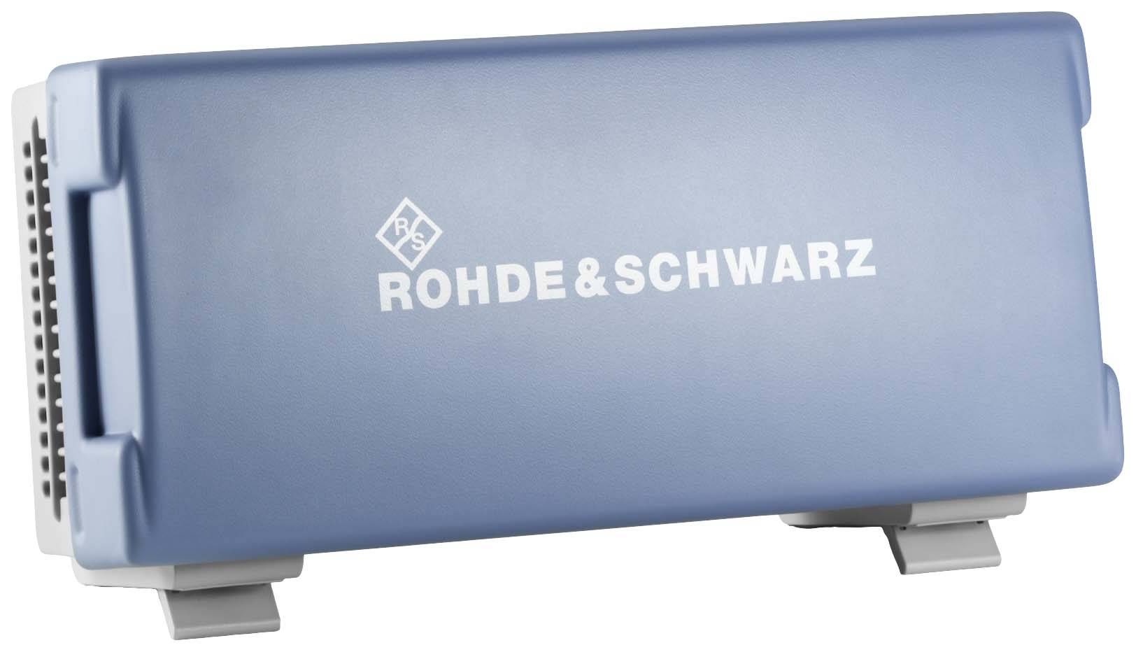 Modré zařízení s nápisem 'Rohde & Schwarz' na přední straně.