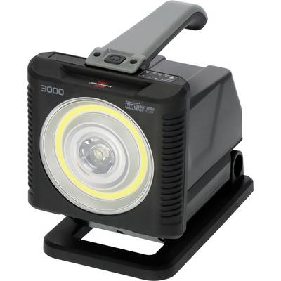 Přenosné černé pracovní LED světlo s rukojetí a stojanem, zobrazené z tříčtvrtinového pohledu s velkou kulatou přední čočkou a označením "3000".