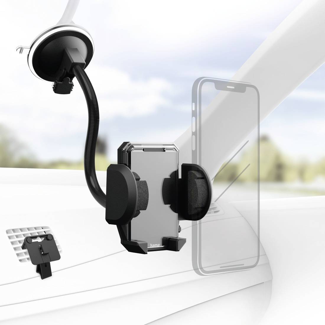 Mobilní telefon je upevněn v držáku, který je pomocí přísavky připevněn k palubní desce automobilu.