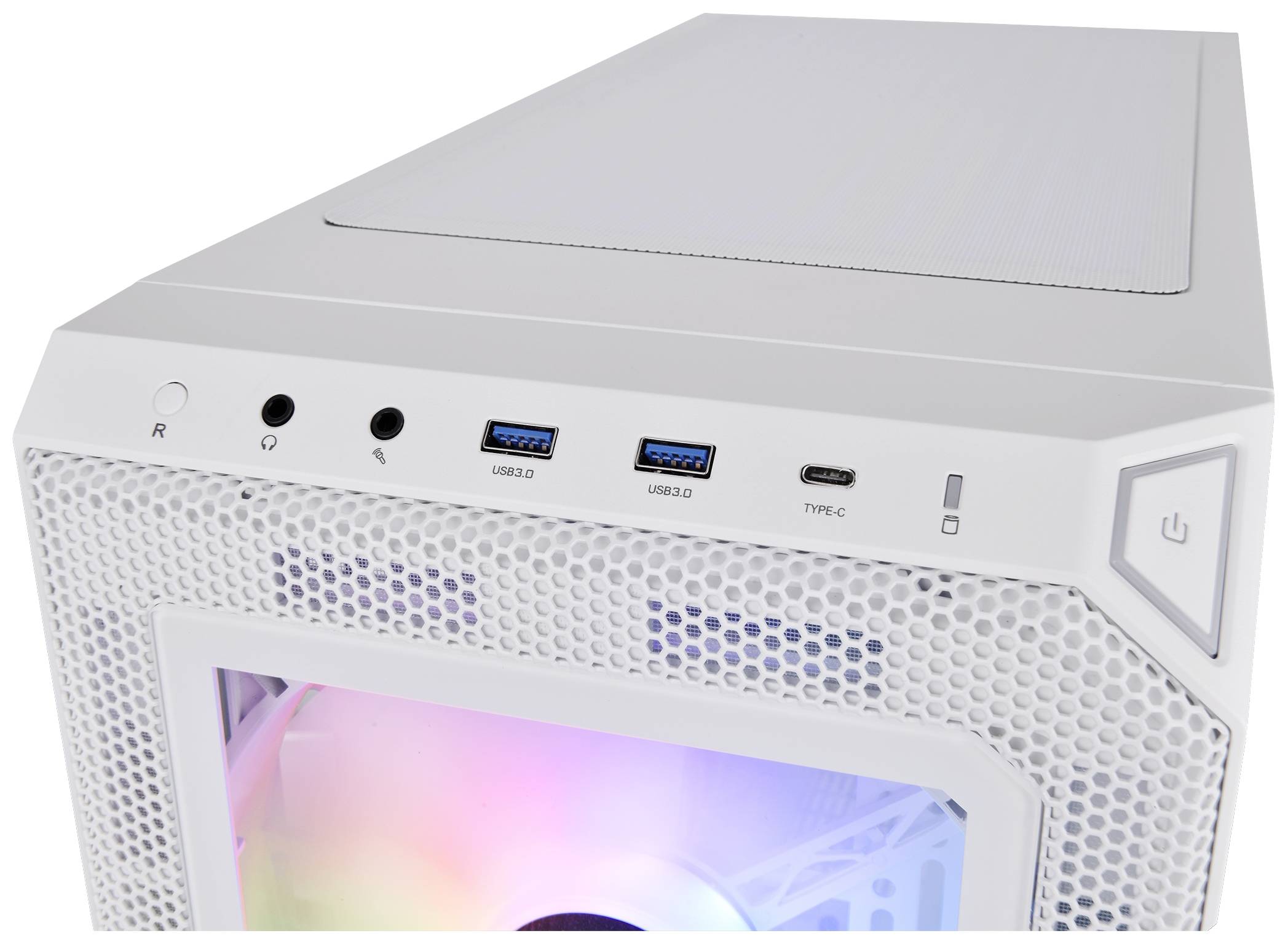 Bílý počítačový kryt s USB porty a osvětleným ventilátorem. Nahoře jsou umístěny konektory pro sluchátka a USB.