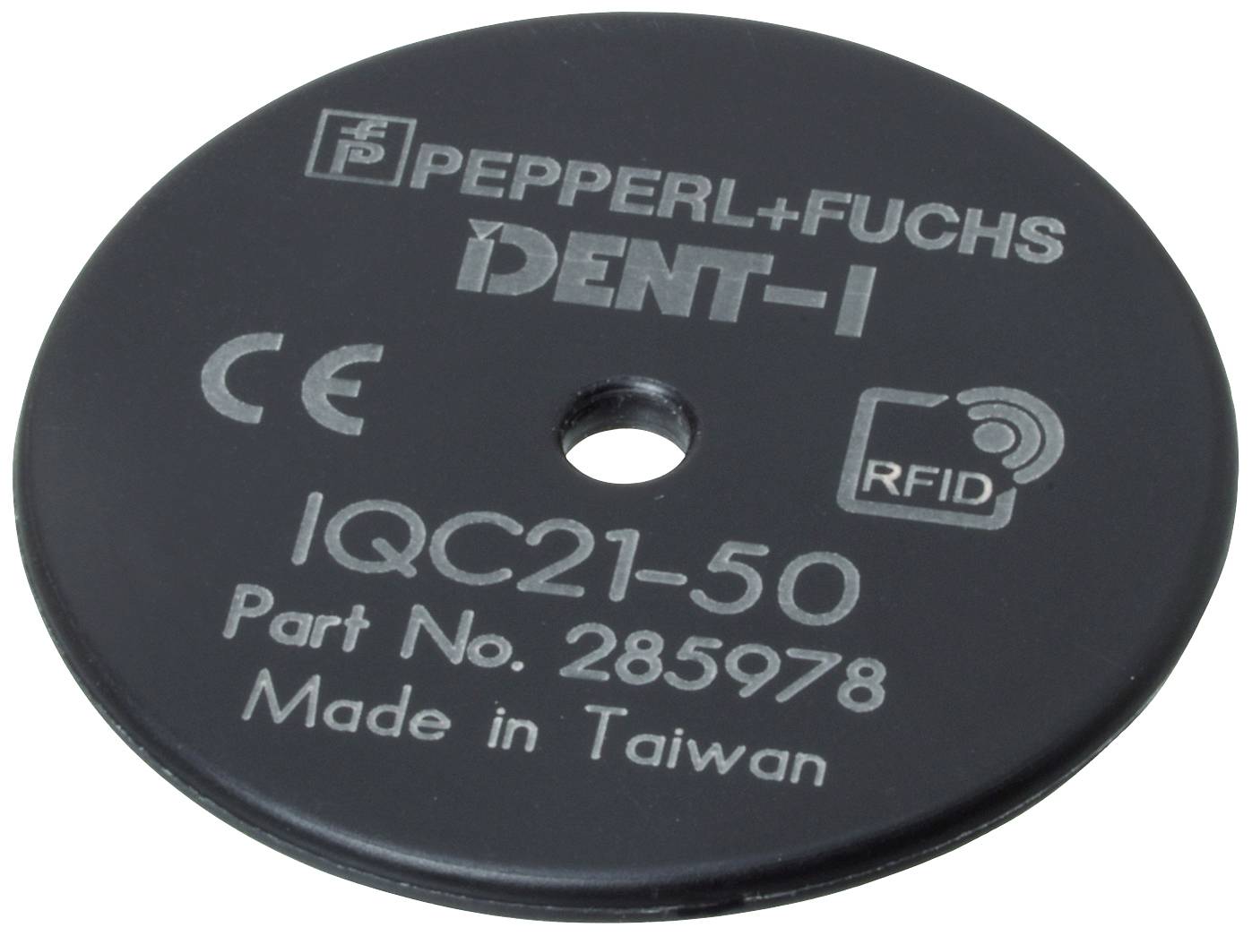 Černý RFID štítek od společnosti Pepperl+Fuchs s nápisem 'PEPPERL+FUCHS DENT-I', 'IQC21-50', 'Part No. 285978', 'Vyrobeno na Tchaj-wanu'.