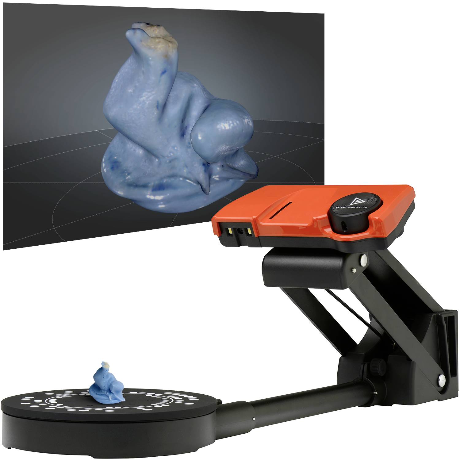 3D skener skenuje modrou žabí figurku na otočném stolku. Na obrazovce je zobrazován naskenovaný 3D model žáby.