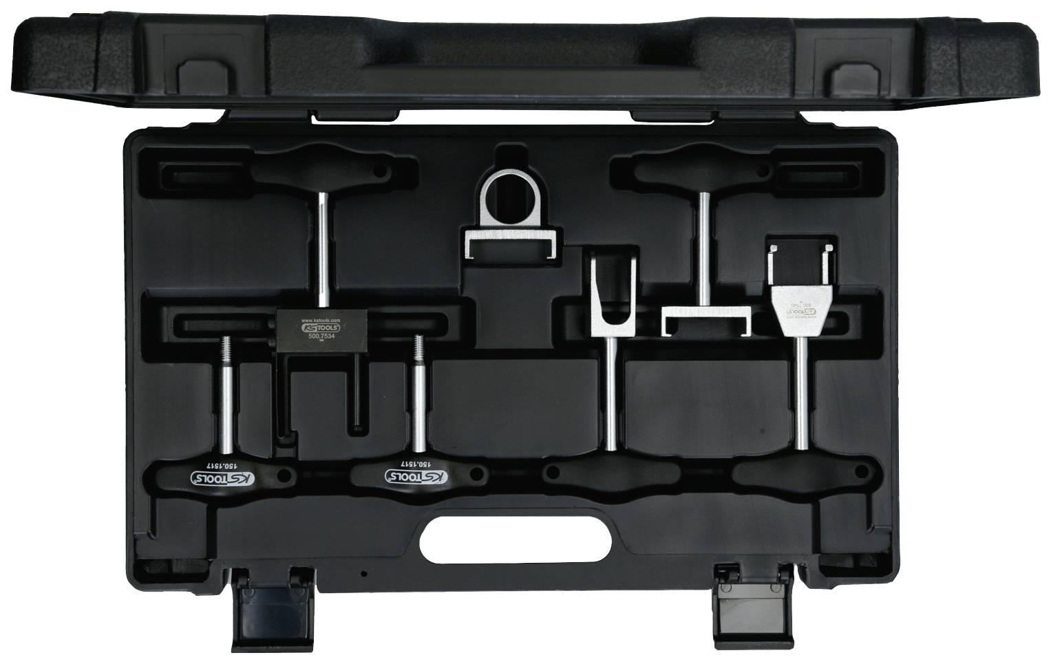 Otevřená sada nástrojů s různými stahovacími přípravky na kulové klouby a speciálními nástroji, pečlivě uspořádanými v pěnových vložkách.