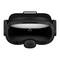 VR headset z přední strany, černý, s hladkým designem povrchu a nápisem 'VIVE'. Nahoře má popruh pro upevnění.