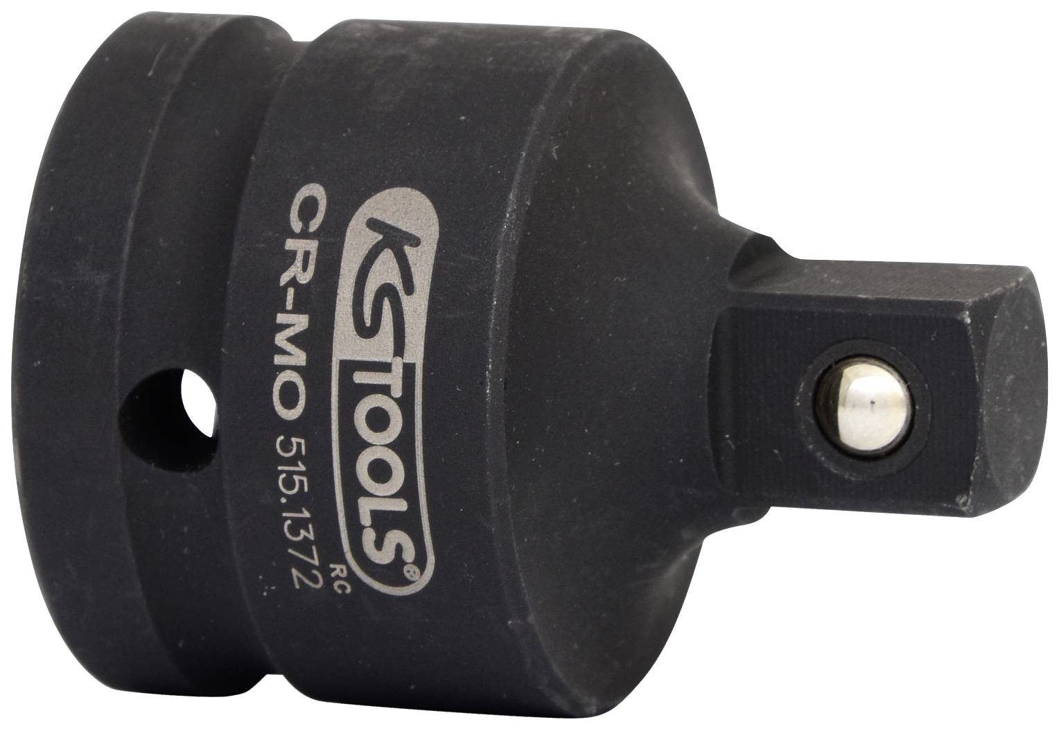 Kulatý adaptérový nástavec se čtvercovým otvorem, černý kov, označený štítkem 'KG TOOLS CR-MO 515.1372'.