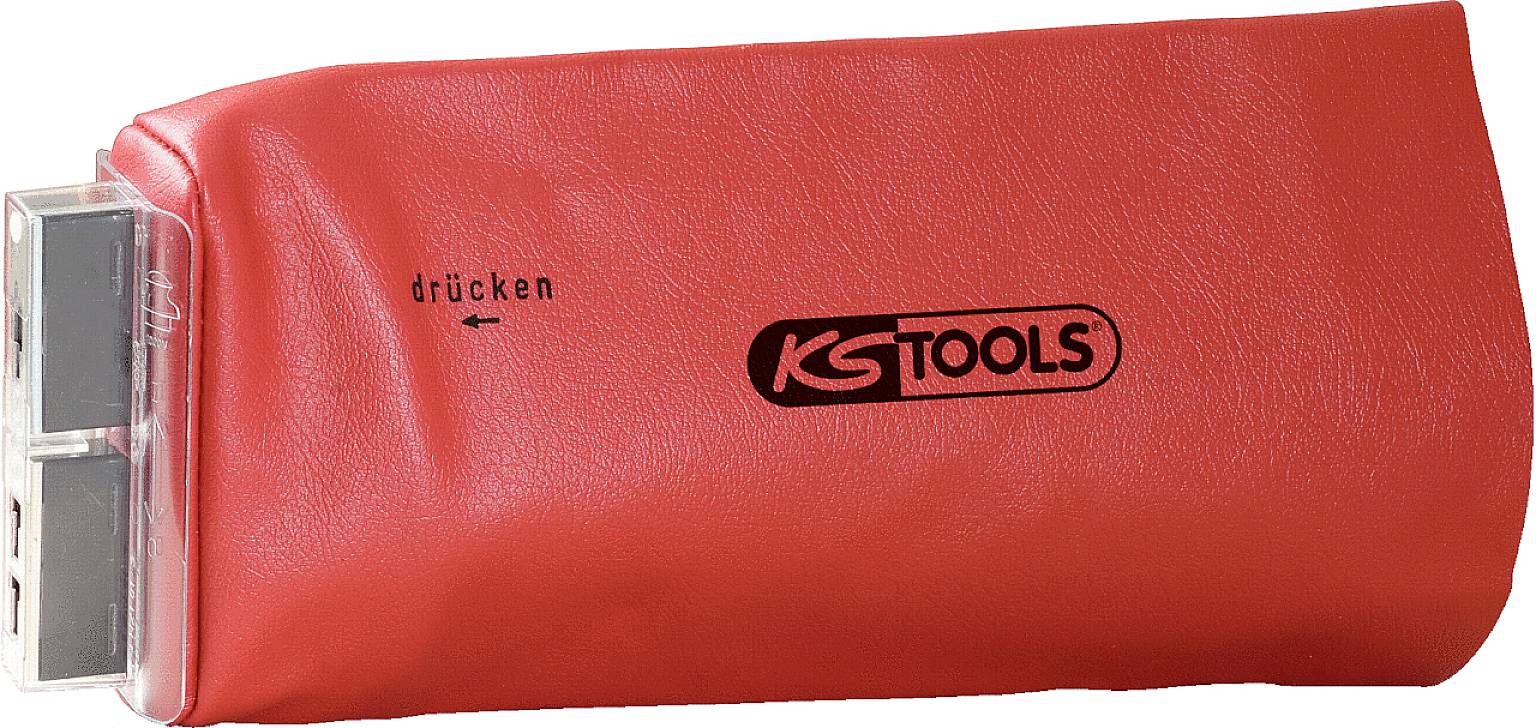 Červený bezpečnostní airbag od KS Tools s nápisem "stisknout". Používá se k zajištění předmětů během práce.