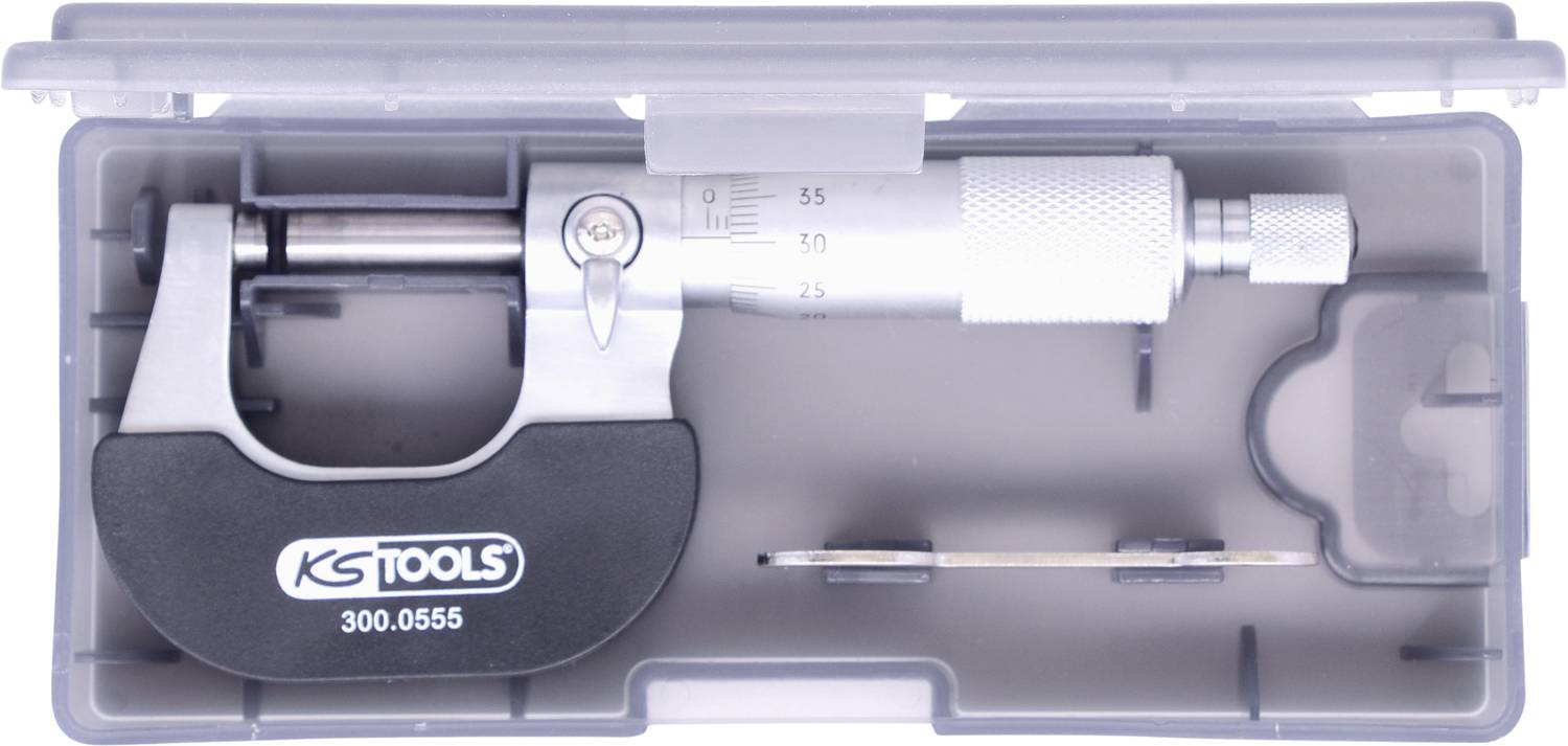Posuvné měřidlo v pevném pouzdře, nástroj s rozpoznatelnou značkou, vybavené stupnicí a šroubovacím mechanismem. Vlevo označení 'KS TOOLS 300.0555'.