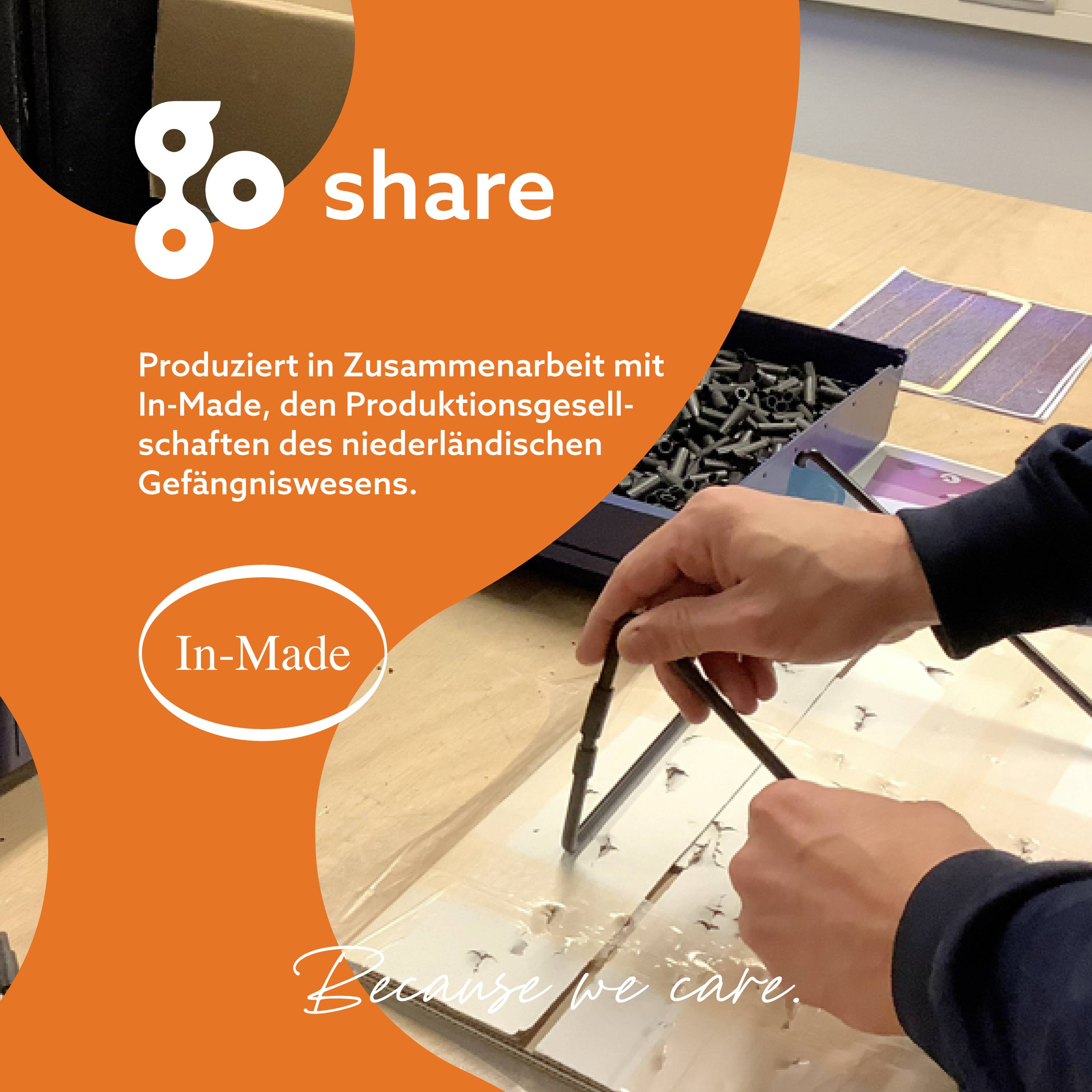 Dvě ruce montují výrobek v dílně. Text v obraze: 'go share', 'Vyrobeno ve spolupráci s In-Made', 'Protože nám záleží.'