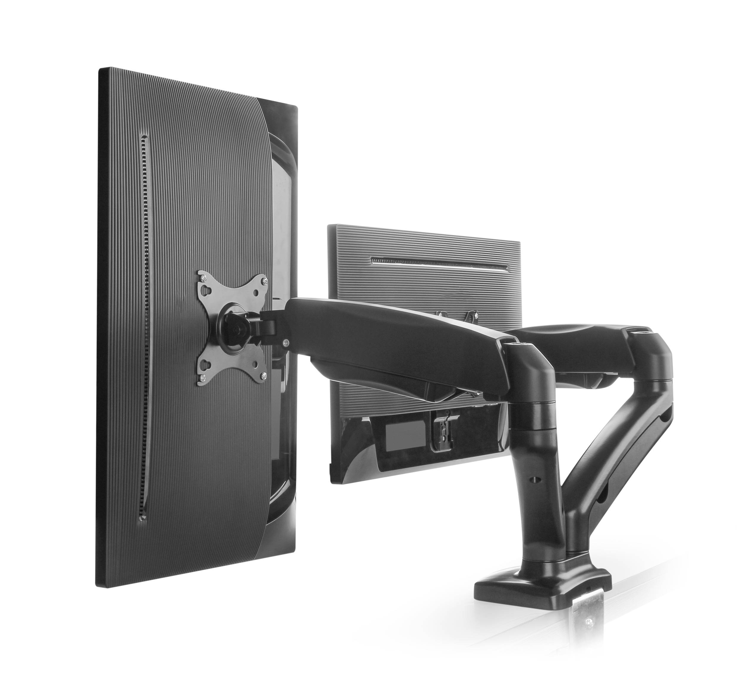 Dva monitory umístěné na flexibilním, nastavitelném rameni připevněném k psacímu stolu představují ergonomické pracovní řešení.
