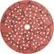 Kulatý brusný kotouč, červený, s mnoha malými bílými otvory a černými kruhovými vzory, určený pro broušení.