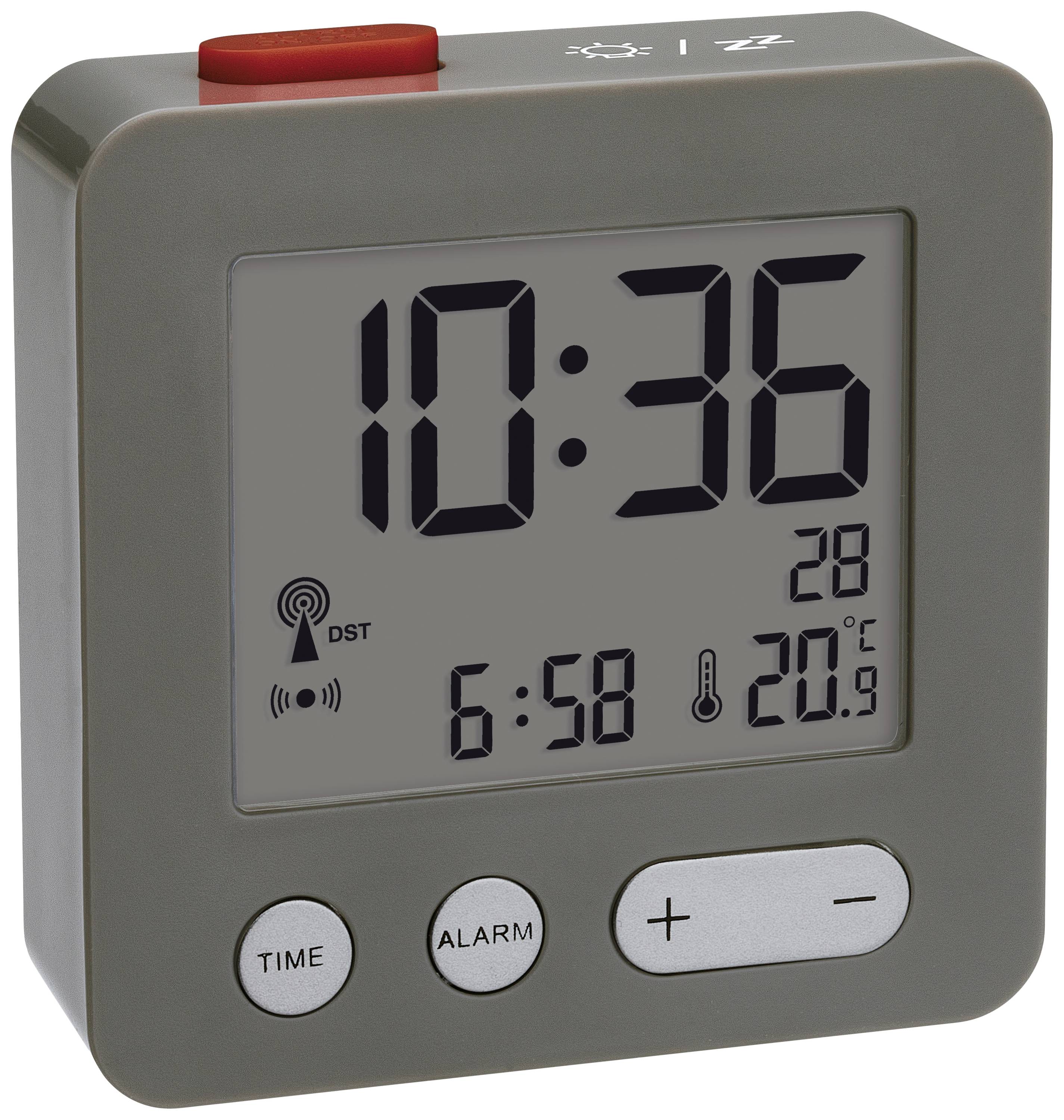 Elektronický stolní budík ukazuje 10:36, 28. den, 20,9 stupňů Celsia, čas alarmu 6:58. Funkce pro čas, alarm, nastavení plus/mínus.