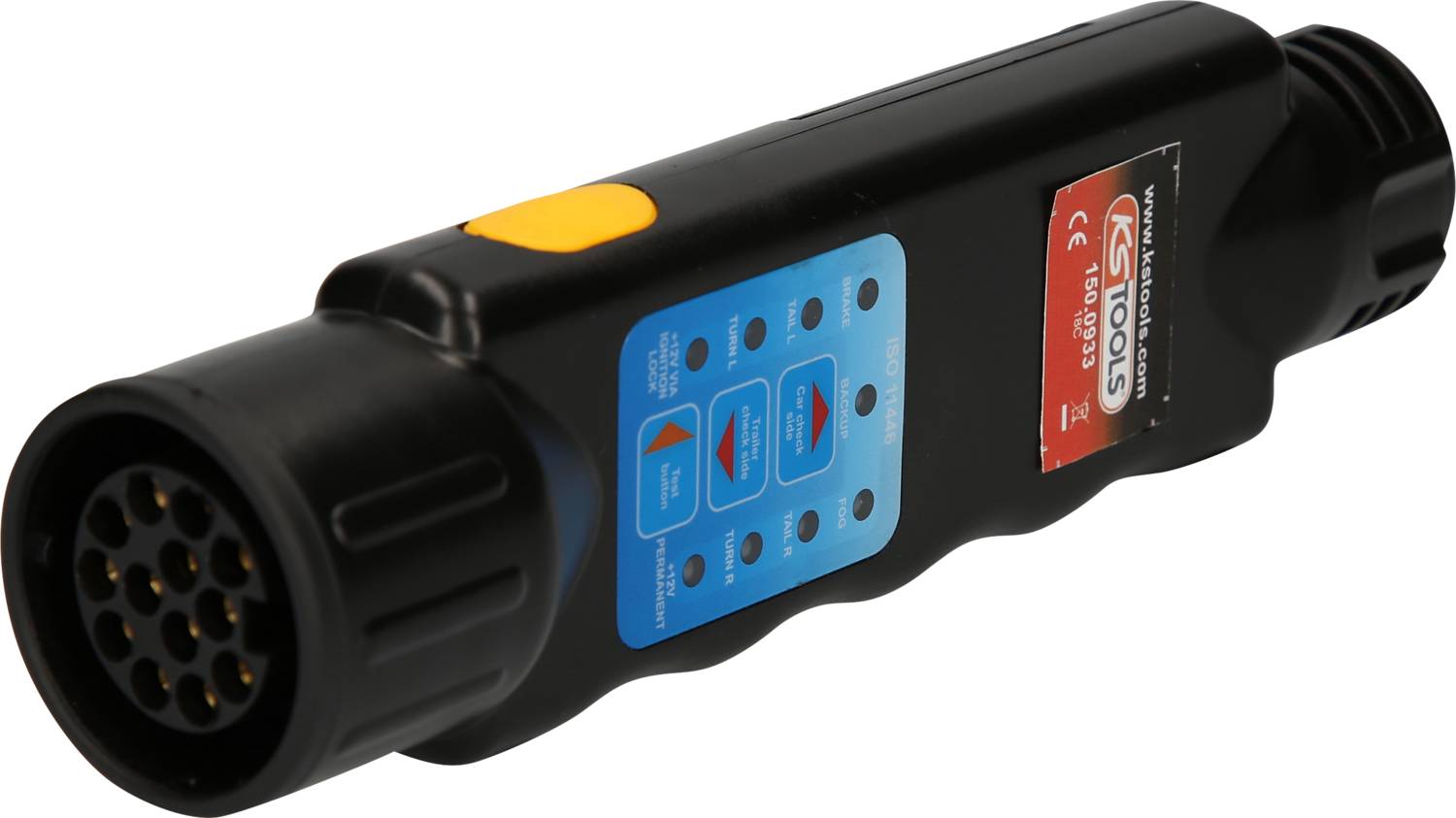 Černý elektrický tester s modrým ovládacím panelem a žlutým tlačítkem pro kontrolu světel a připojení přívěsu.