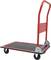 Červený transportní vozík s černou plošinou a čtyřmi koly, ideální pro snadnou přepravu těžkých předmětů.