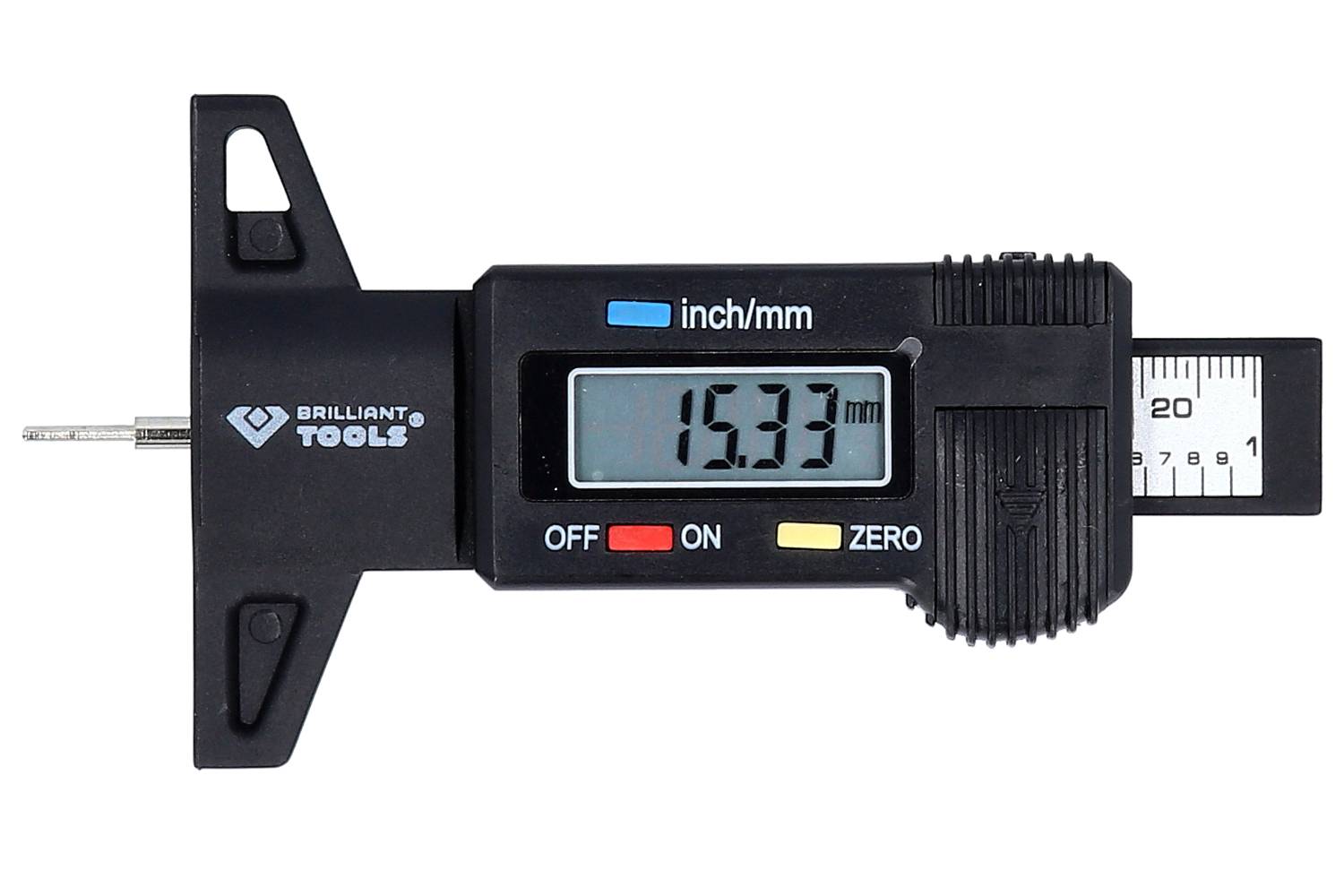 Digitální posuvné měřítko ukazuje '15,33 mm'. Používá se pro přesné měření vzdáleností a průměrů v technických aplikacích.