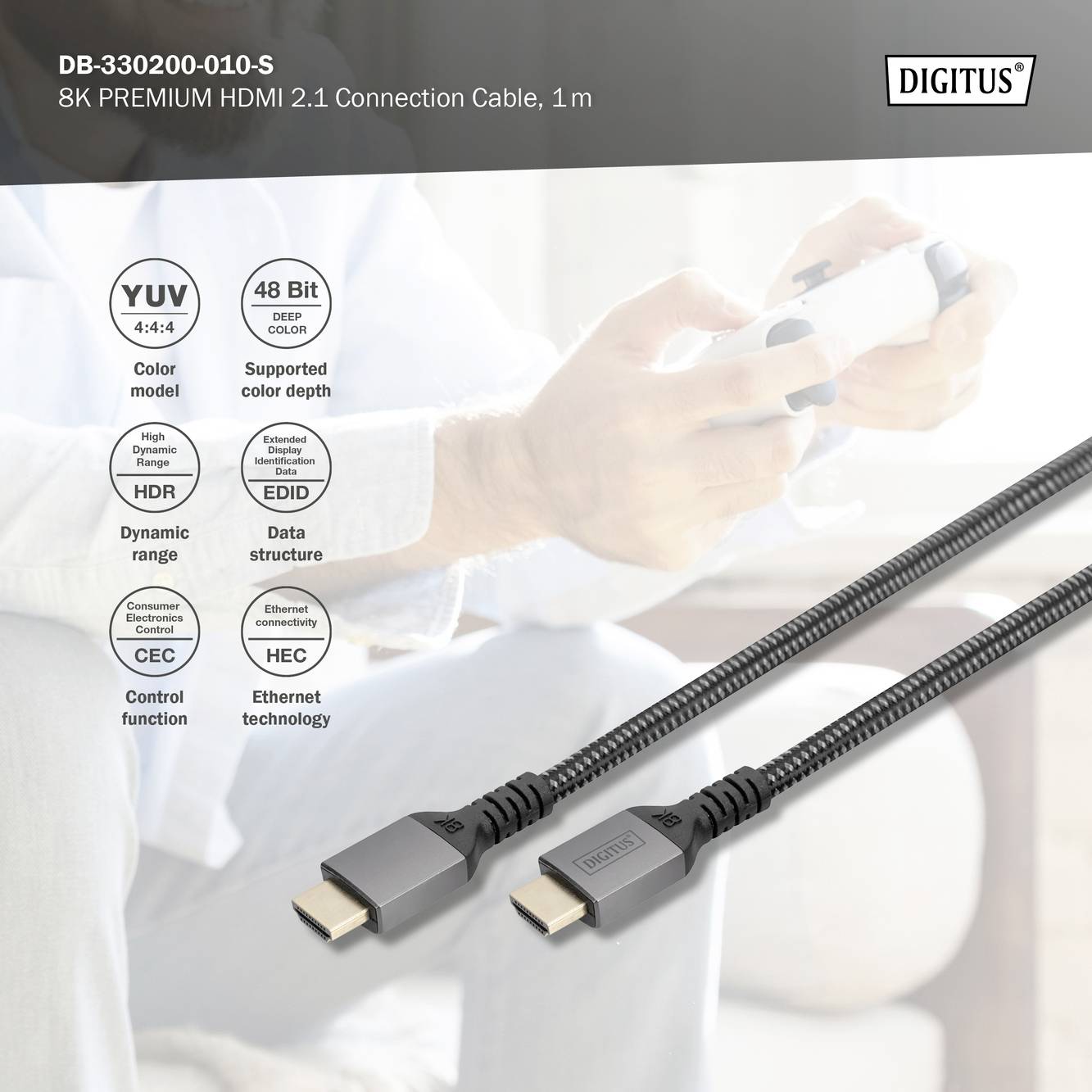 Na stole leží HDMI kabel. Na obalu je napsáno: '8K PRÉMIOVÝ HDMI 2.1 připojovací kabel, 1,0m'.