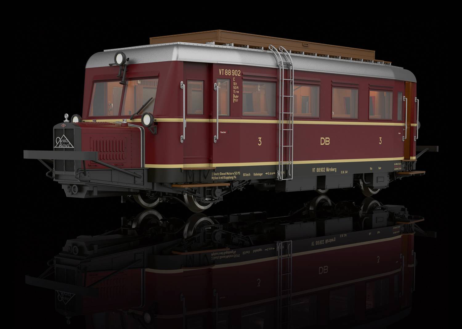 Červený železniční motorový vůz Deutsche Bahn s nápisem 'VB 98802 Bertrieb'. Vůz má tři okna a stříbrné detaily.