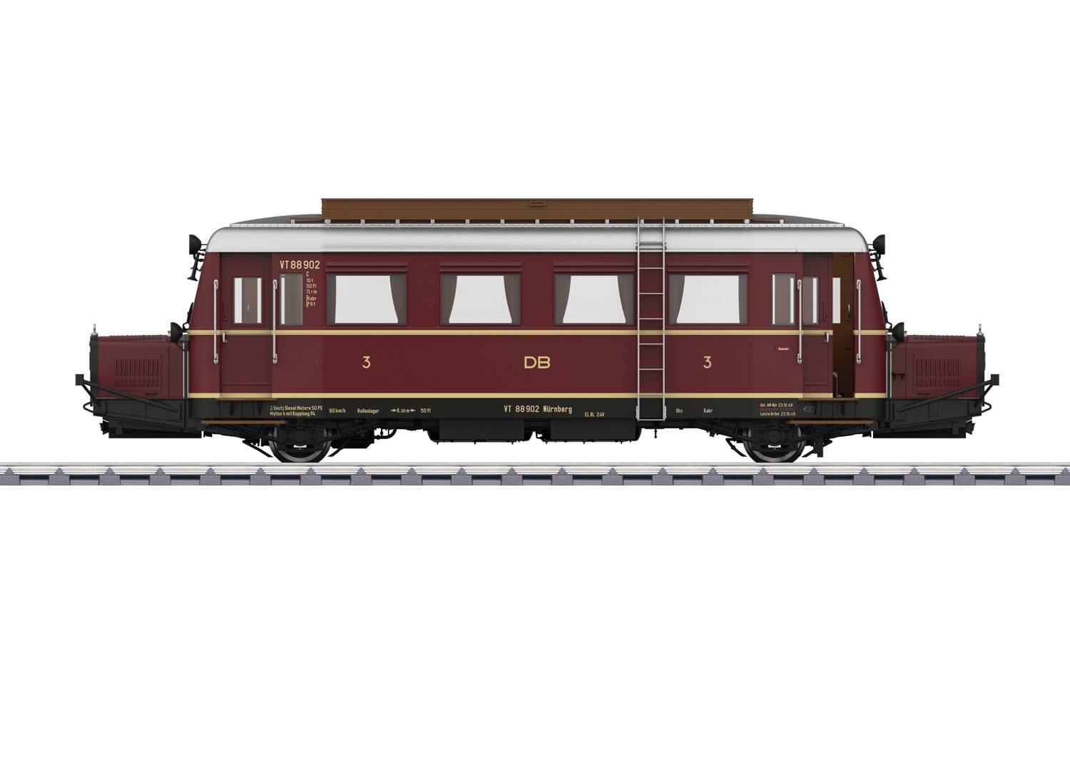 Červenohnědý historický vlak Deutsche Bahn stojící na kolejích. Vlak má několik oken a nese nápis 'DB'.