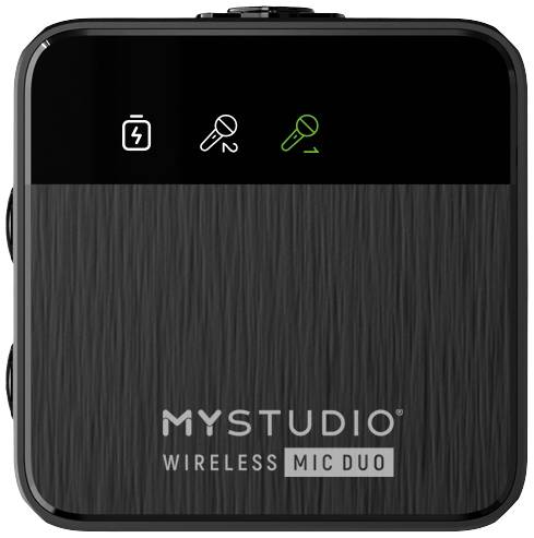 Černý bezdrátový mikrofonový vysílač s ikonami baterie a mikrofonu na displeji. Logo 'MYSTUDIO WIRELESS MIC DUO' dole.