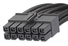 12pinový konektor PCIe 5.0 12VHPWR: Černý 12pólový napájecí konektor pro grafické karty, propojený několika černými kabely.