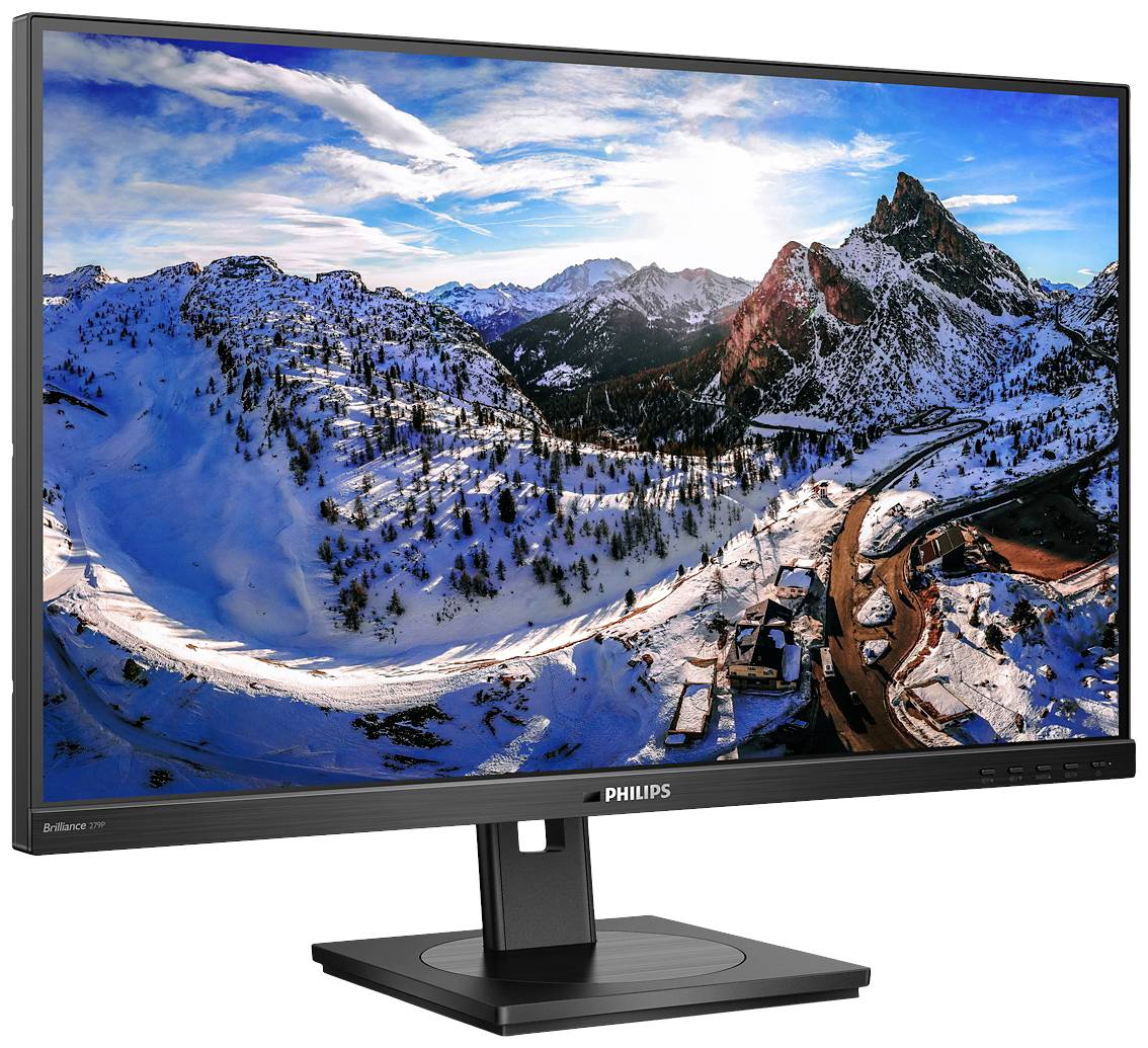 Počítačový monitor značky Philips zobrazuje zasněžené horské panorama s cestou, která se vine krajinou.
