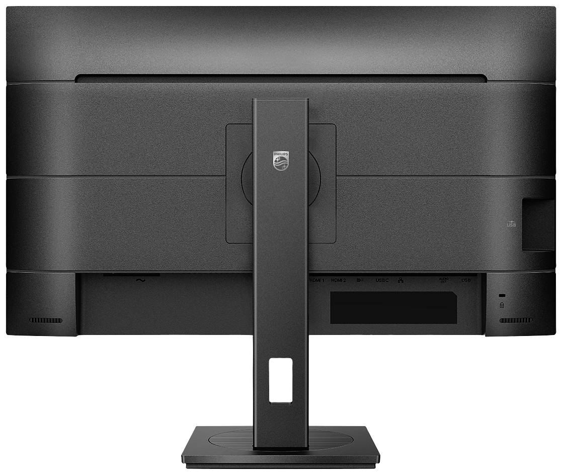 Zadní pohled na černý počítačový monitor se stabilní podstavou a organizací kabeláže.