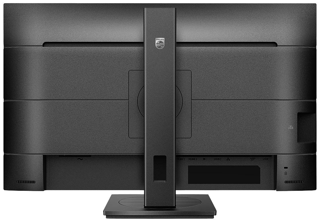 Černý počítačový monitor zezadu, umístěný na obdélníkovém stojanu.