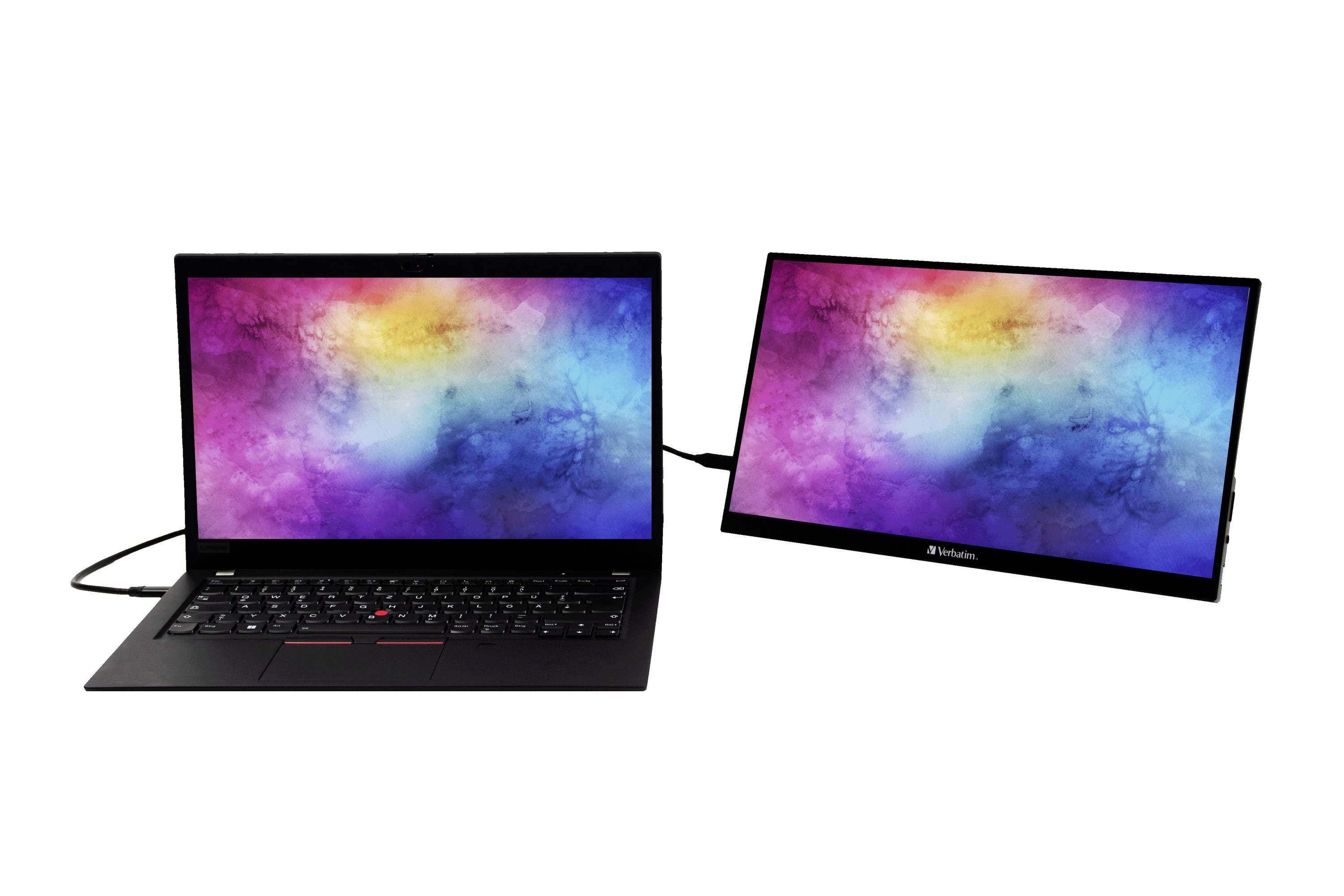 Notebook a druhý monitor vedle sebe, oba zobrazují barevné, abstraktní pozadí. Monitor je připojen kabelem.