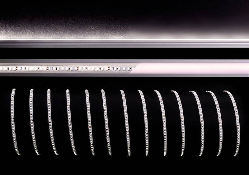 Několik paralelních linií tvořených malými svítícími body na černém pozadí vytváří moderní, abstraktní design.