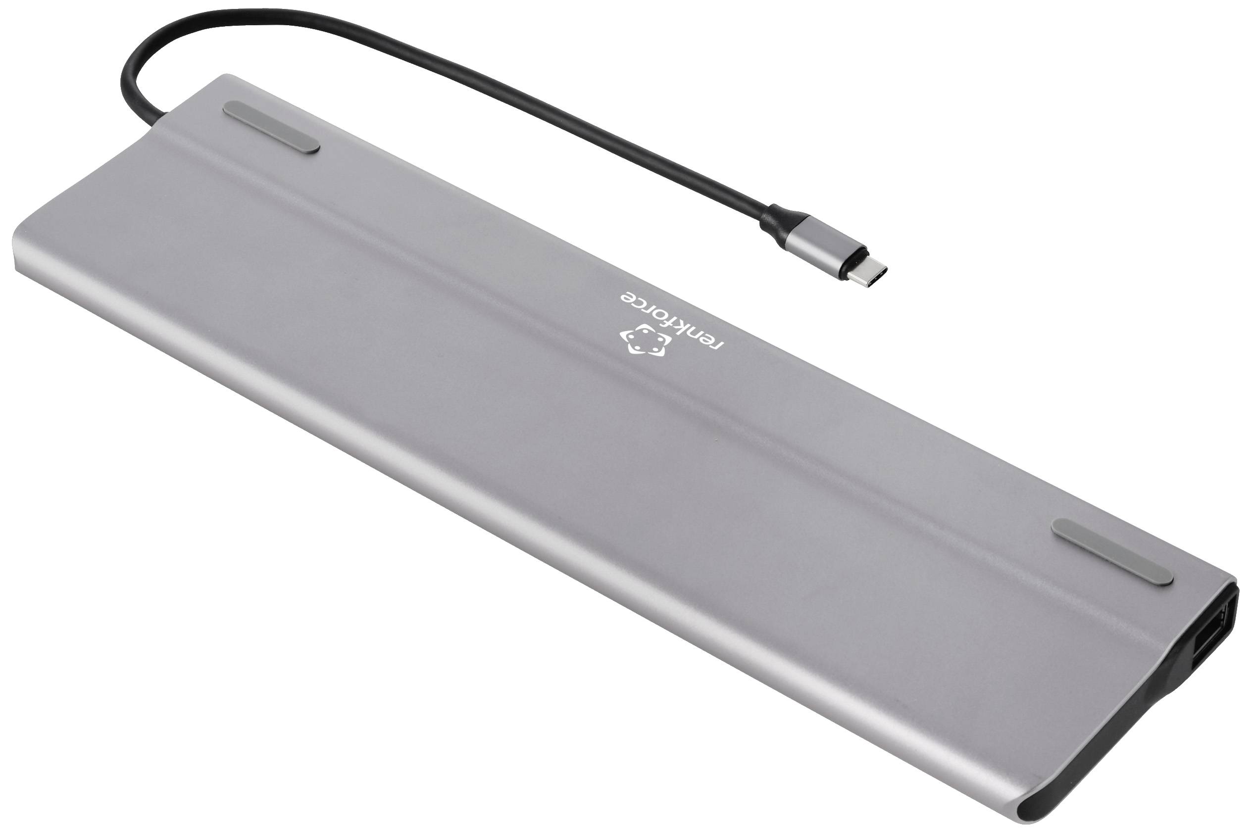 Stříbrný USB-C hub s několika porty pro rozšíření konektivity počítačů nebo mobilních zařízení.