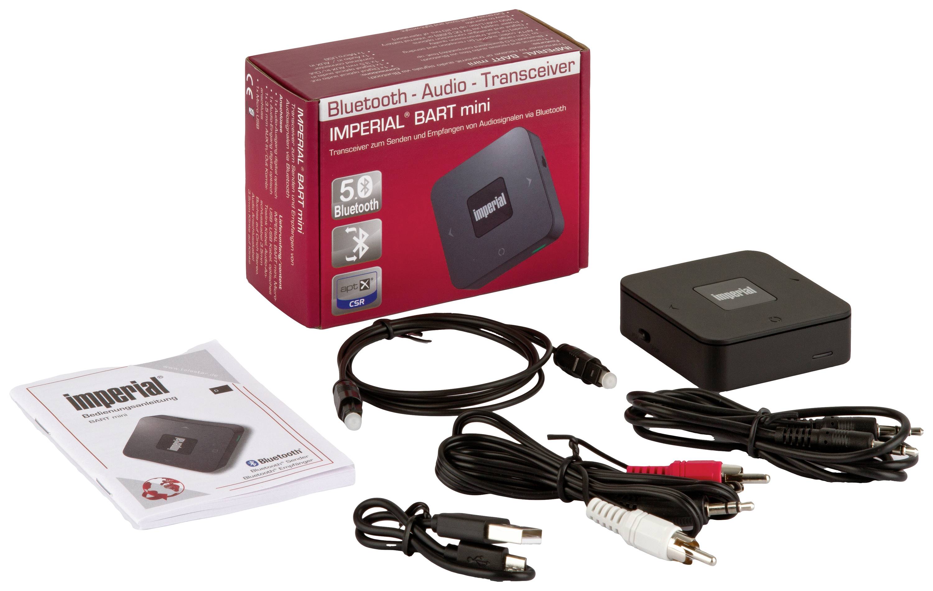 Bluetooth-audioový transceiver 'Imperial BART mini' s příslušenstvím: různé kabely a manuál. Balení v pozadí.