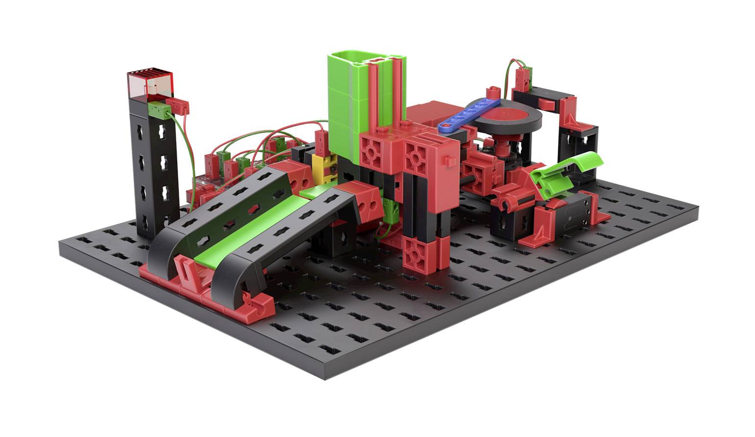 Model stavebnicového výrobního systému ze stavebnicových dílků, skládající se z červených a zelených součástí a černých spojů.