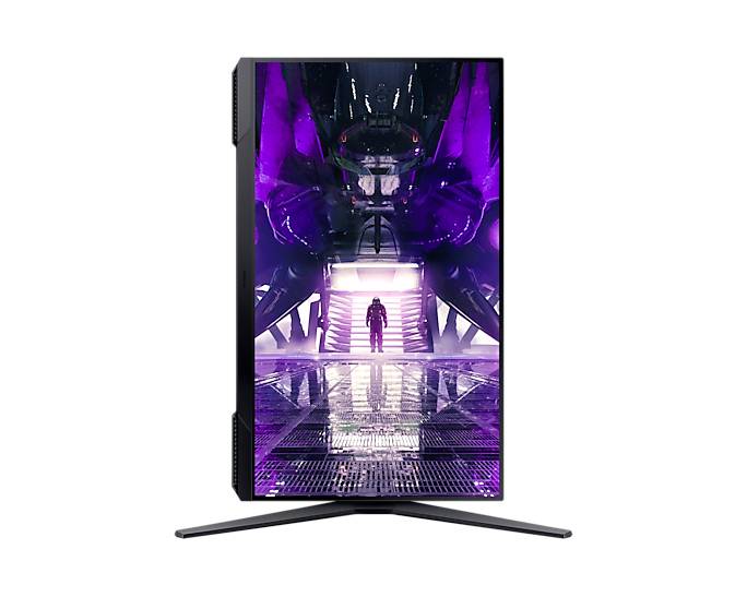 Obraz monitoru na výšku zobrazující sci-fi motiv s futuristickou scénou a osobou před jasně osvětlenými dveřmi.