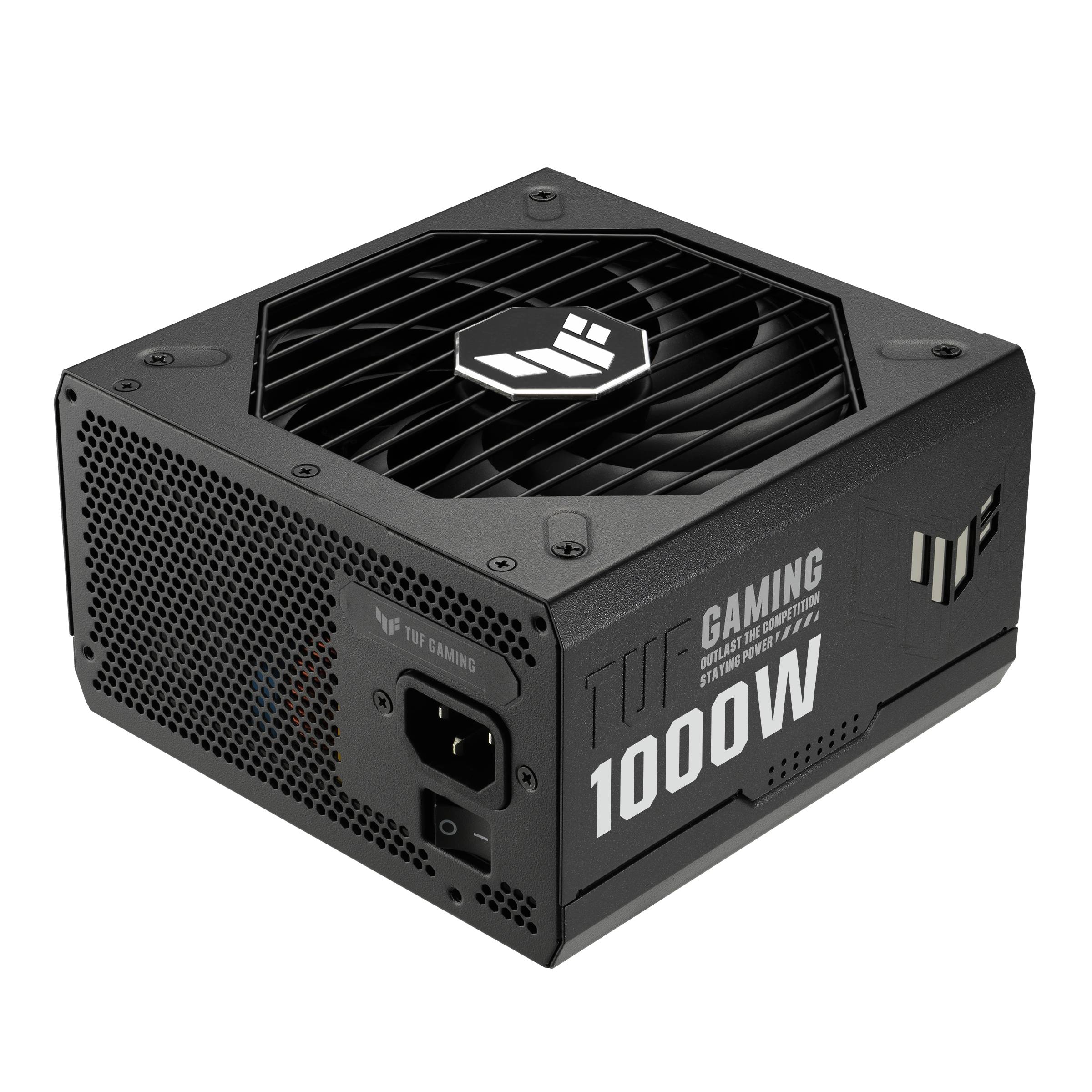 Napájecí zdroj 'TUF Gaming 1000W'. Černý, robustní design s ventilátorem nahoře, viditelným vypínačem výkonu a logem.