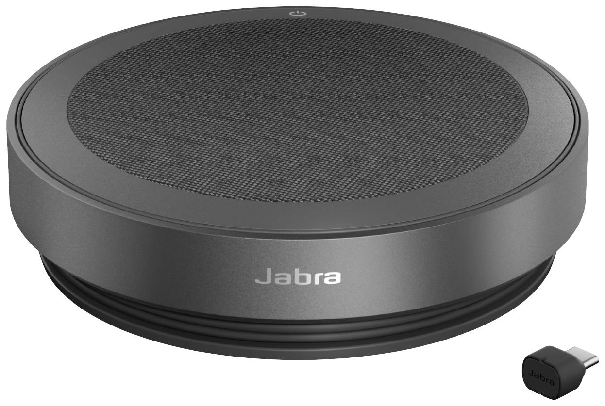 Přenosný, kulatý, černý reproduktor od Jabry, kompatibilní s bezdrátovými zařízeními, vedle malého USB adaptéru.