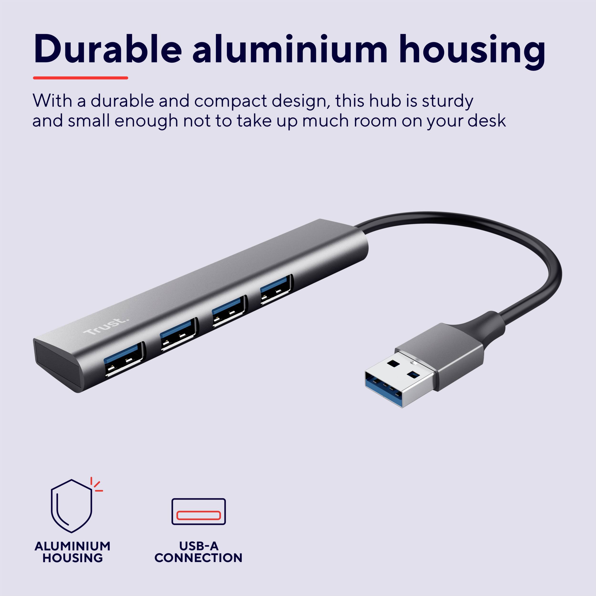 Štíhlý, šedý USB hub s několika porty, propagovaný jako odolný a kompaktní. Text: 'Robustní hliníkové pouzdro'.