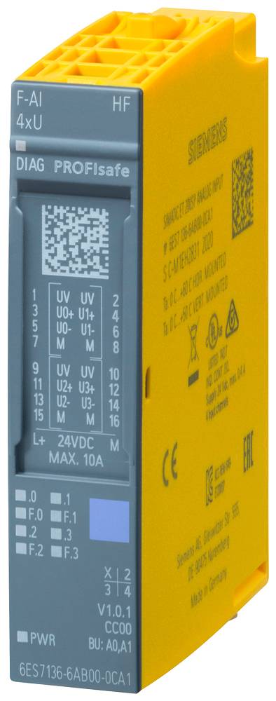 Žlutý elektronický modul s šedým předním panelem. Štítek zobrazuje elektrické specifikace a QR kódy. Viditelný název značky.