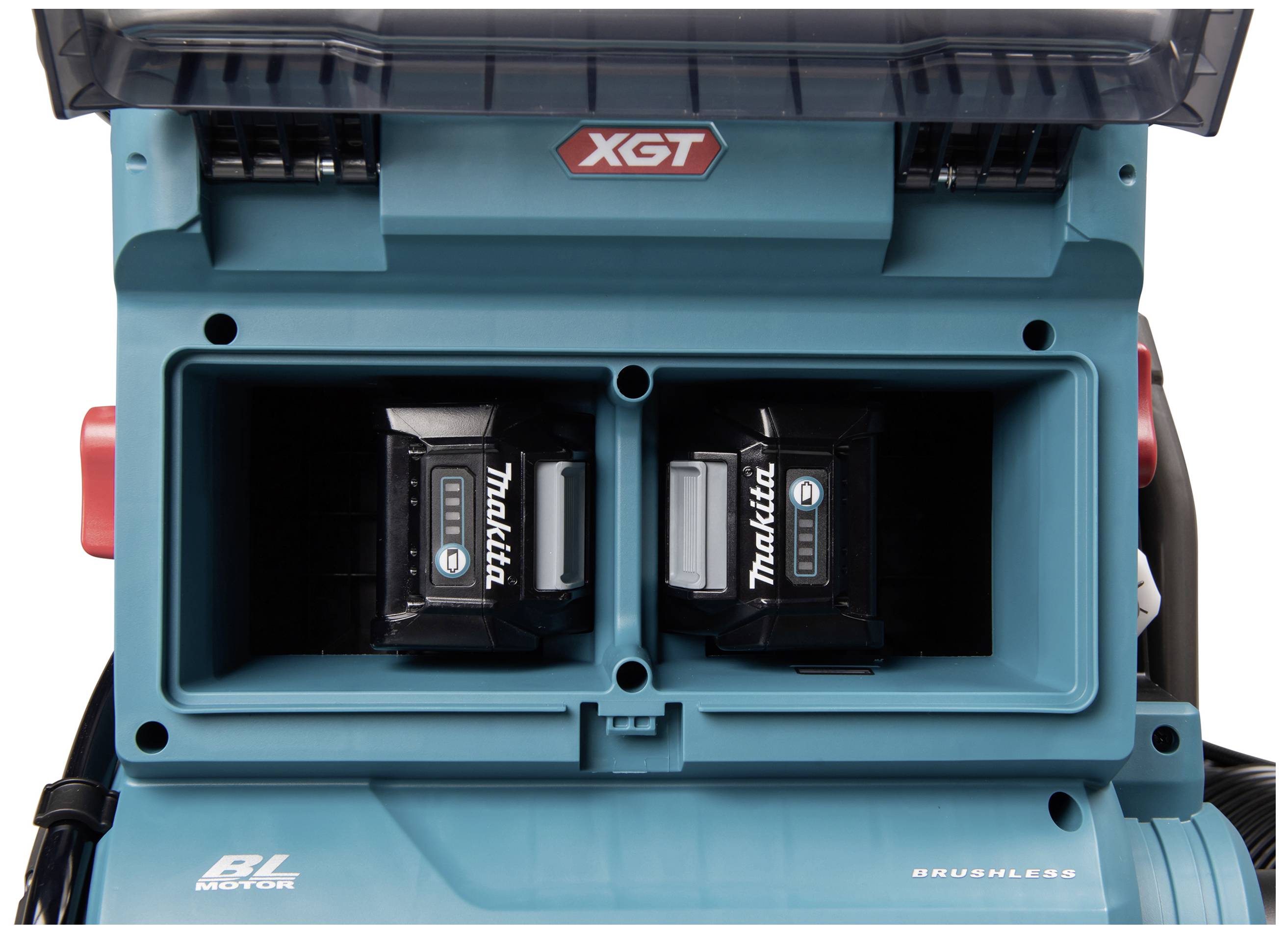 Battery charger with two Makita batteries in an open charging compartment. On top it says 'XGT'. The device looks robust and industrial.