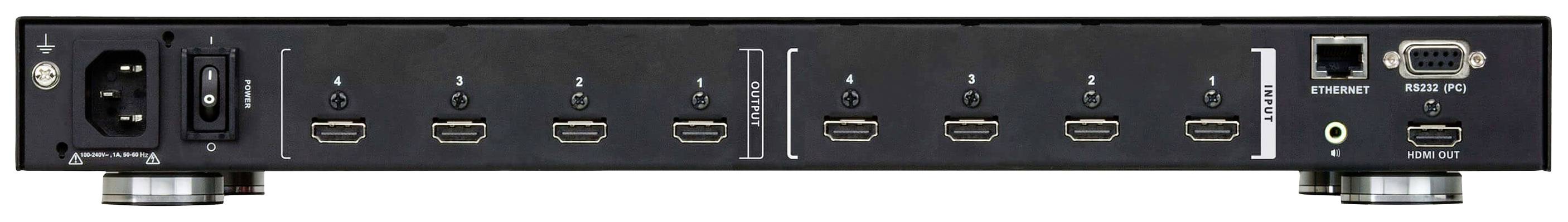 Zadní strana elektronického zařízení s několika HDMI porty, napájecím konektorem, ethernetovým portem a audiojackem.