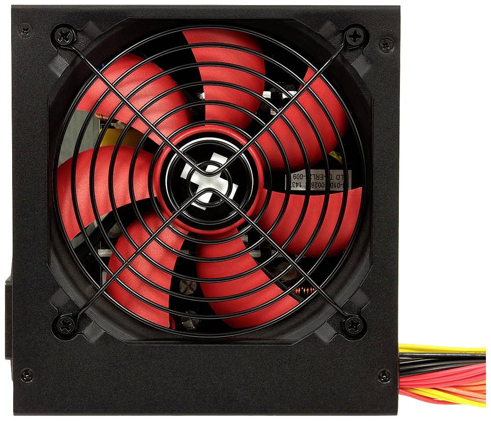 Černý počítačový napájecí zdroj s červeným ventilátorem a několika žlutými kabely pro napájení počítačů.