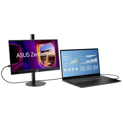 Notebook je připojen k monitoru ASUS ZenScreen. Na displeji notebooku jsou zobrazeny datové vizualizace a analýzy.