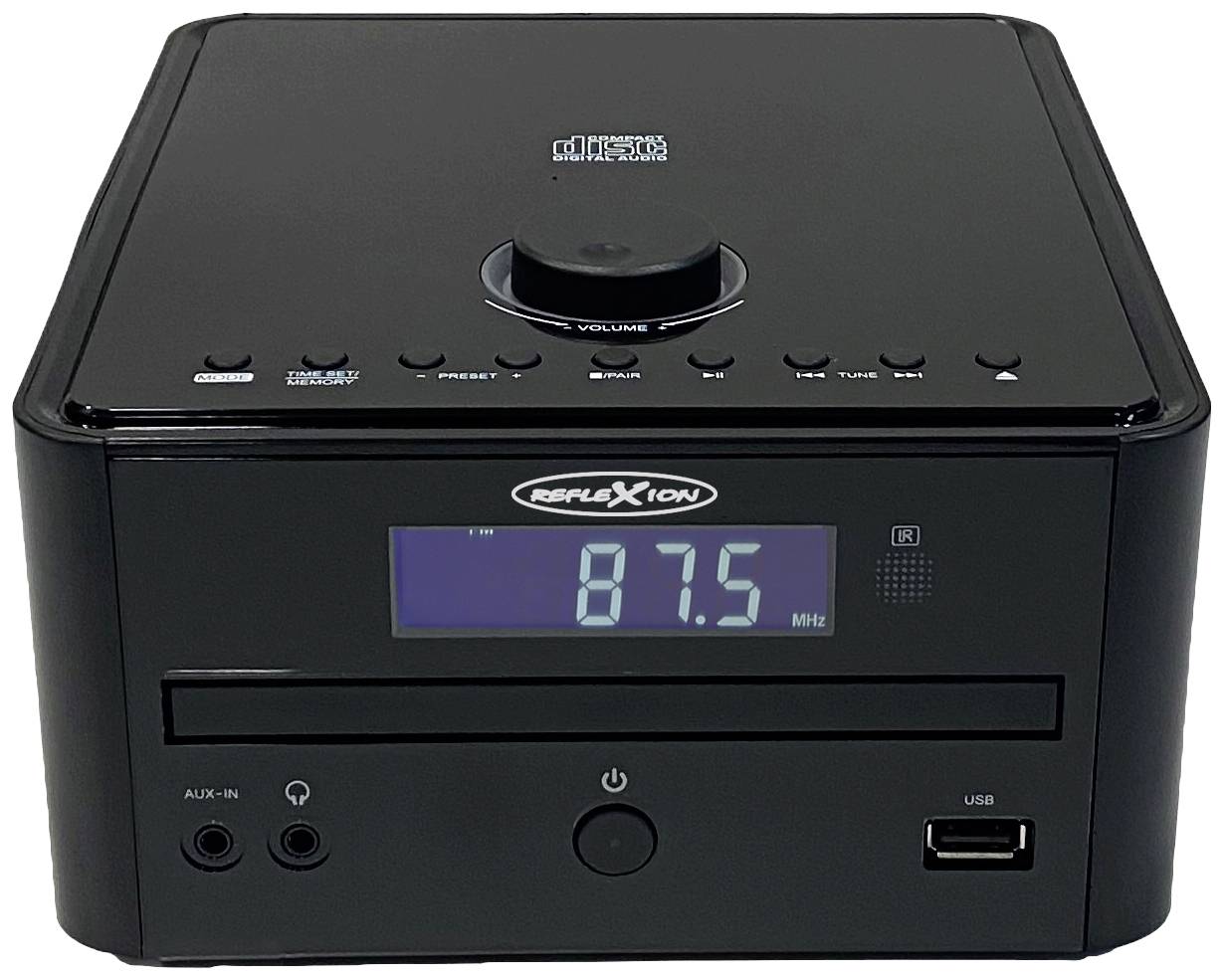 Černé rádio s modrým displejem zobrazuje '87.5 MHz'. Ovládací tlačítka nahoře, AUX vstup a USB port vpředu.