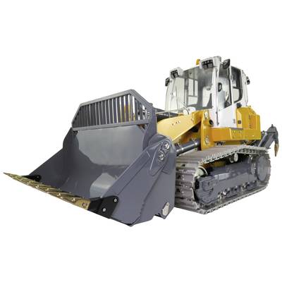 Žlutý bagr s velkou lžící a ocelovými pásy vhodný pro zemní práce nebo stavební projekty.
