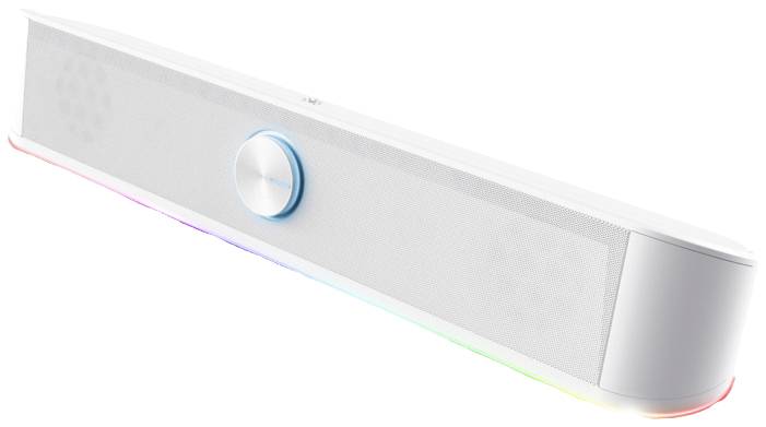 Bílý soundbar se střídovým ovladačem hlasitosti uprostřed, s vestavěným LED podsvícením na spodní straně.