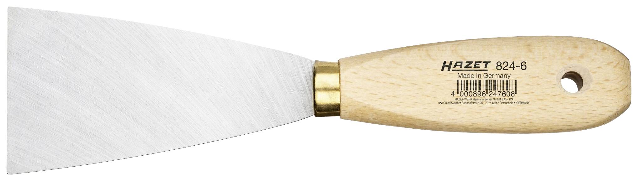 Stěrka s dřevěnou rukojetí a kovovou čepelí. Na rukojeti je nápis 'Hazet 824-6 Made in Germany'. Ideální pro tapetářské práce.
