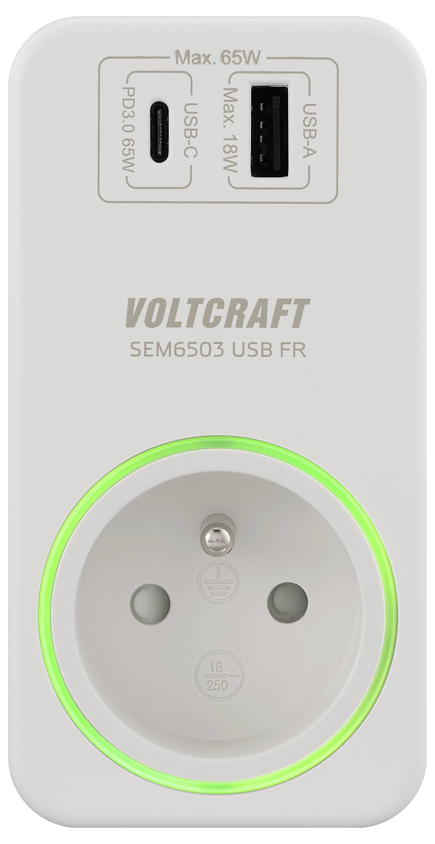 Zásuvka napájení „VOLTCRAFT SEM6503 USB FR" s porty USB-C (65W) a USB-A (18W), svítící zelený LED kroužek indikuje stav napájení.